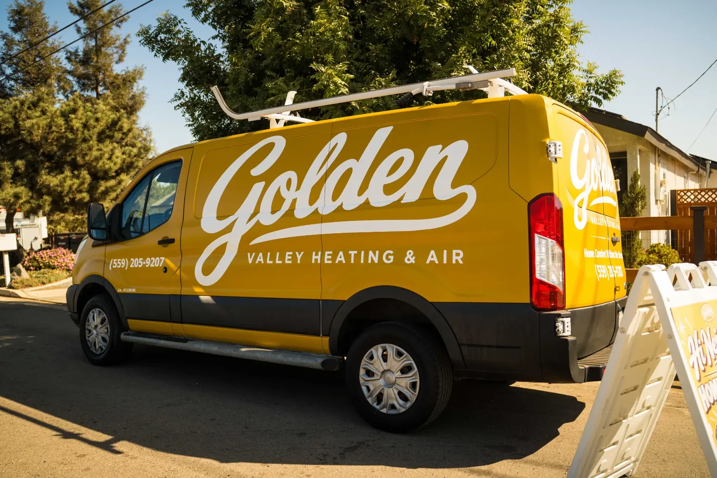 Golden Valley Heating and Air team and service vehicle at an HVAC job — photo 1