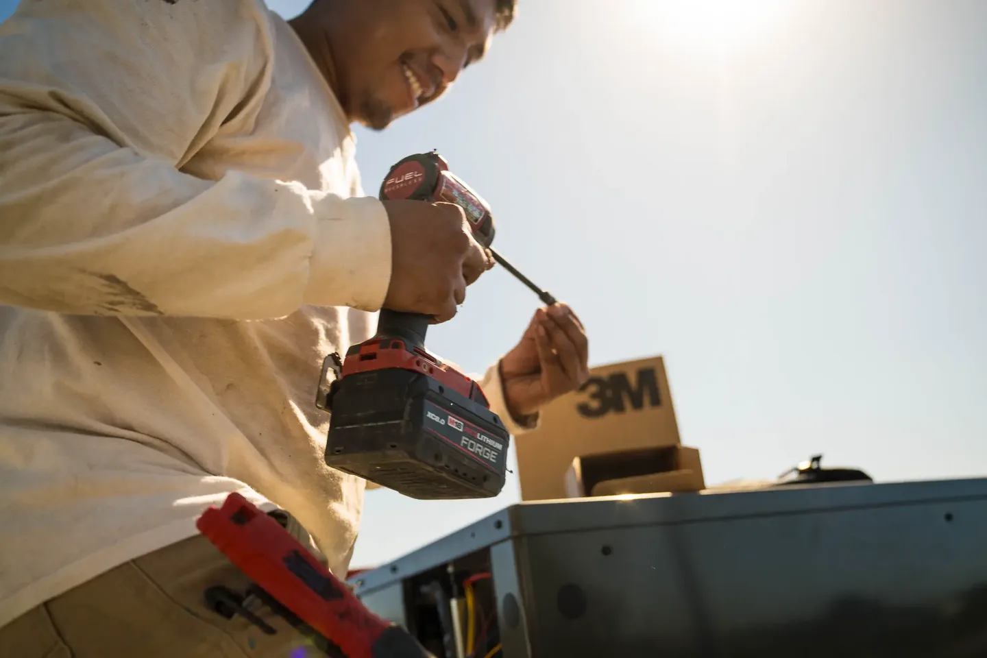 Golden Valley Heating and Air technician servicing rooftop HVAC equipment — photo 3