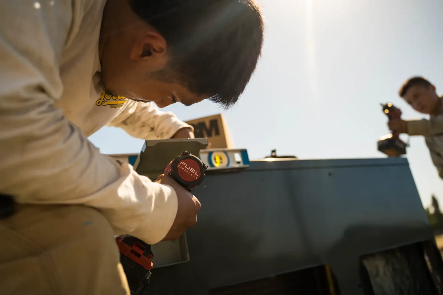 Golden Valley Heating and Air technician servicing rooftop HVAC equipment — photo 5