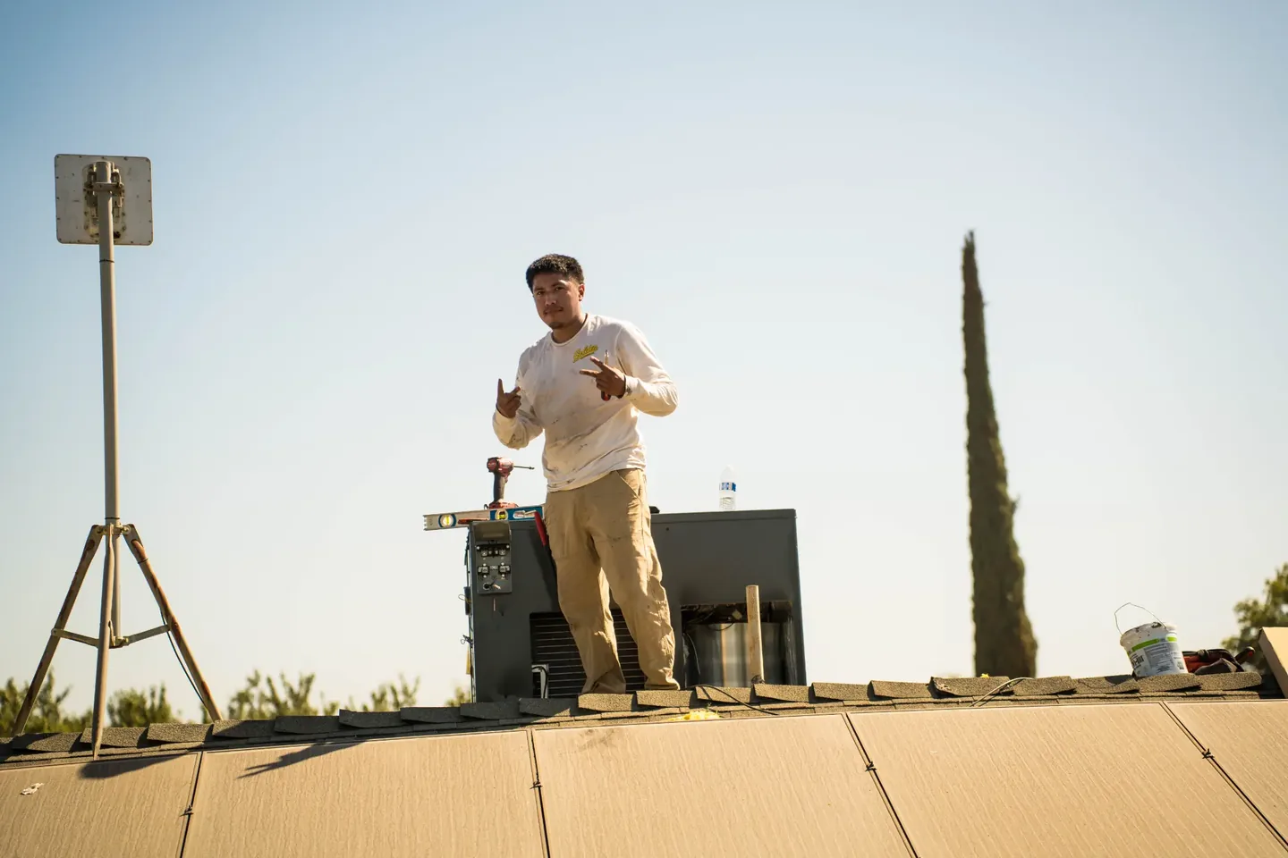 Golden Valley Heating and Air technician servicing rooftop HVAC equipment — photo 21