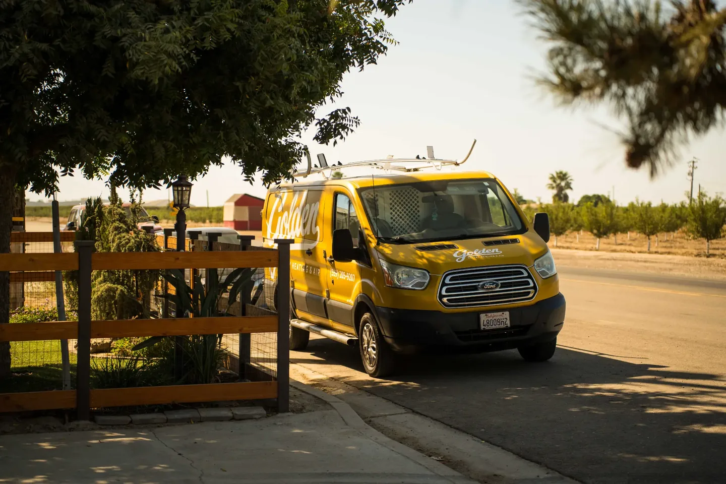 Golden Valley Heating and Air team and service vehicle at an HVAC job — photo 6