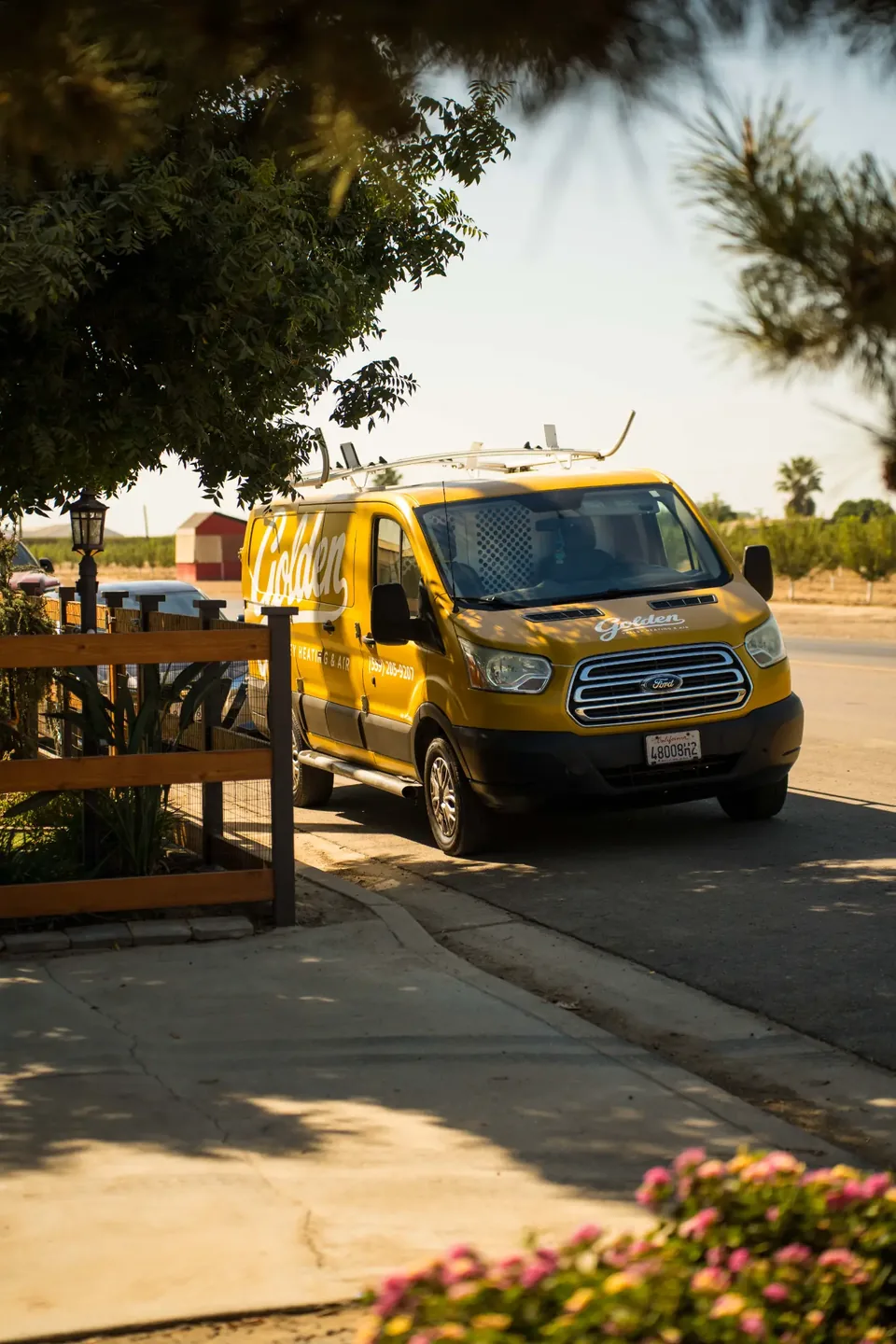 Golden Valley Heating and Air team and service vehicle at an HVAC job — photo 7