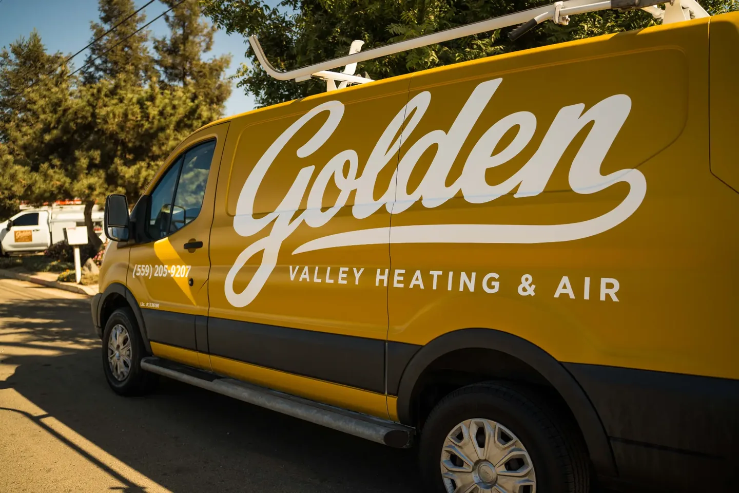Golden Valley Heating and Air team and service vehicle at an HVAC job — photo 9