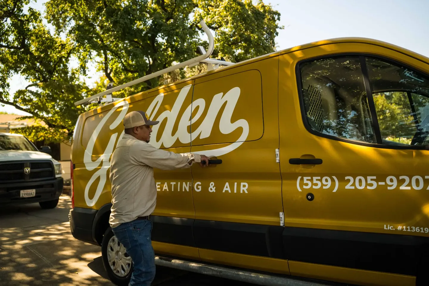 Golden Valley Heating and Air team and service vehicle at an HVAC job — photo 11