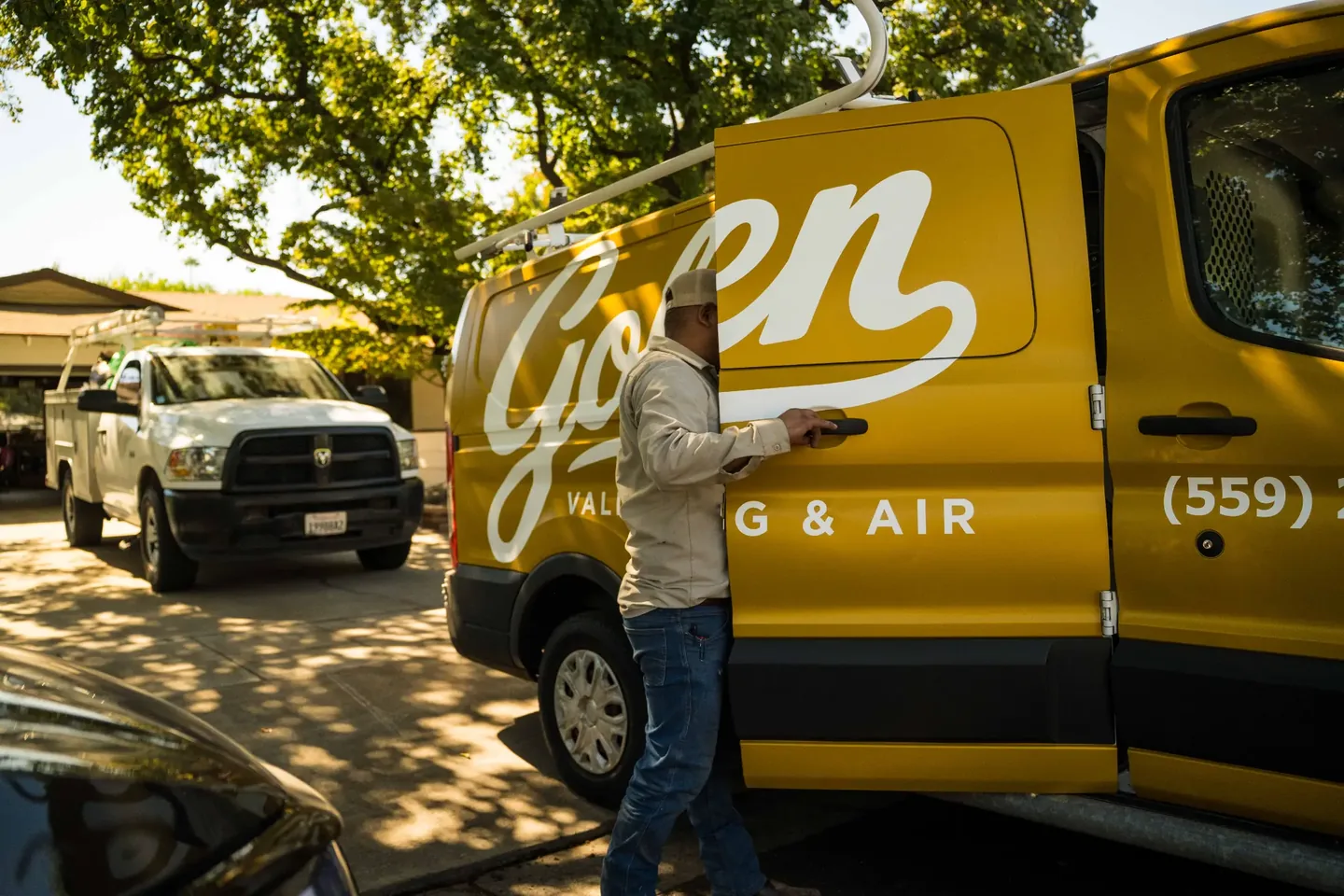 Golden Valley Heating and Air team and service vehicle at an HVAC job — photo 12