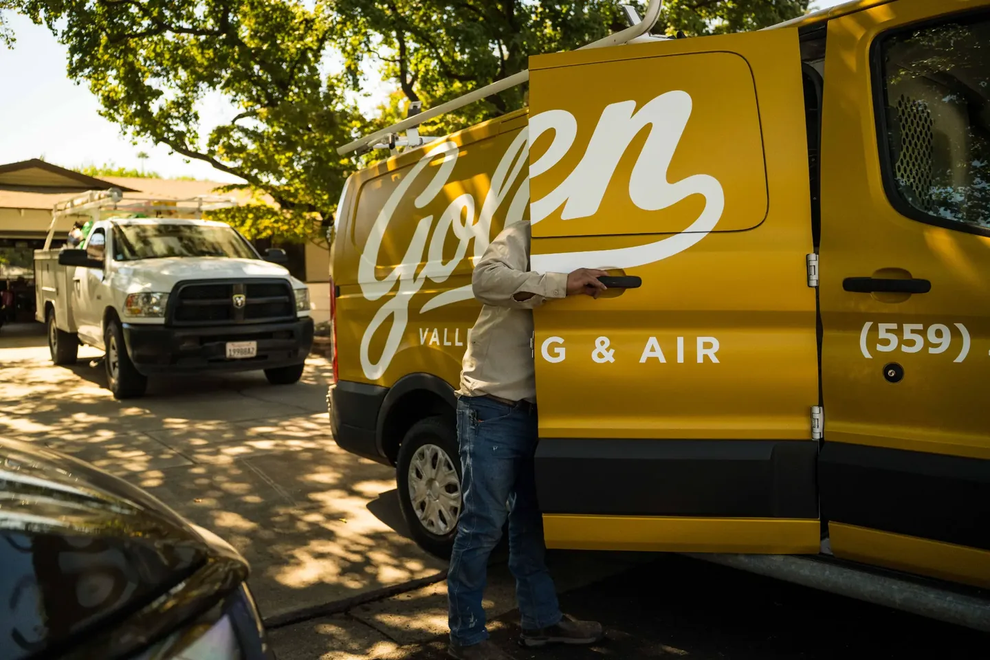 Golden Valley Heating and Air team and service vehicle at an HVAC job — photo 13