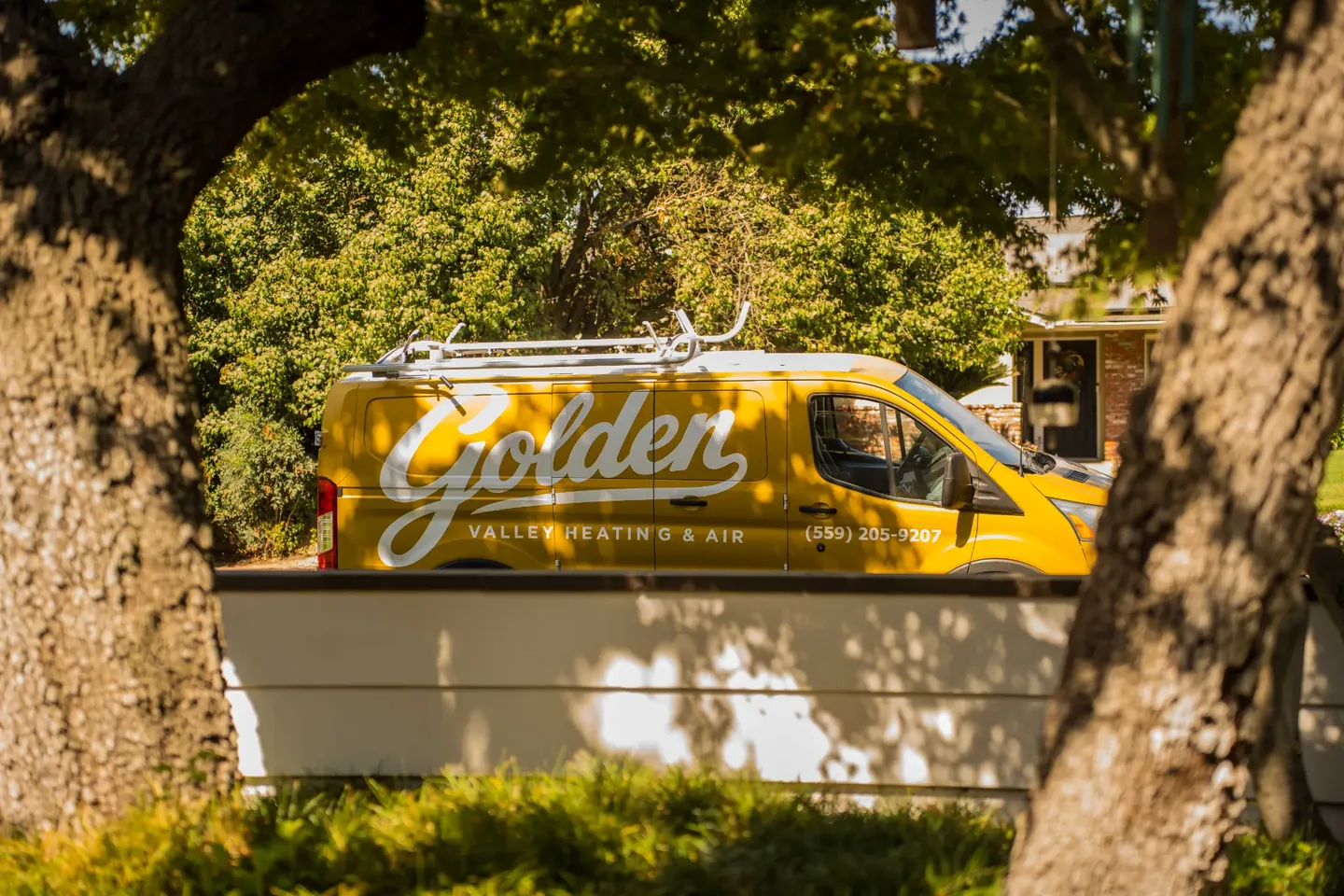 Golden Valley Heating and Air team and service vehicle at an HVAC job — photo 15